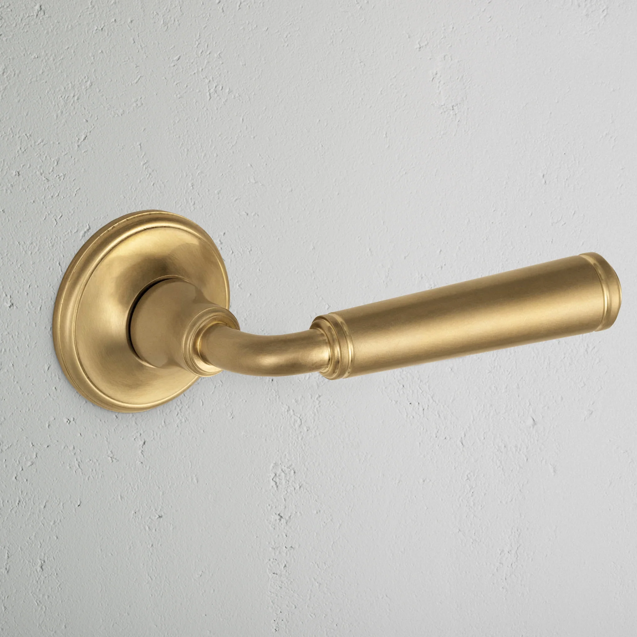 Digby Sprung Door Handle - Antique Brass