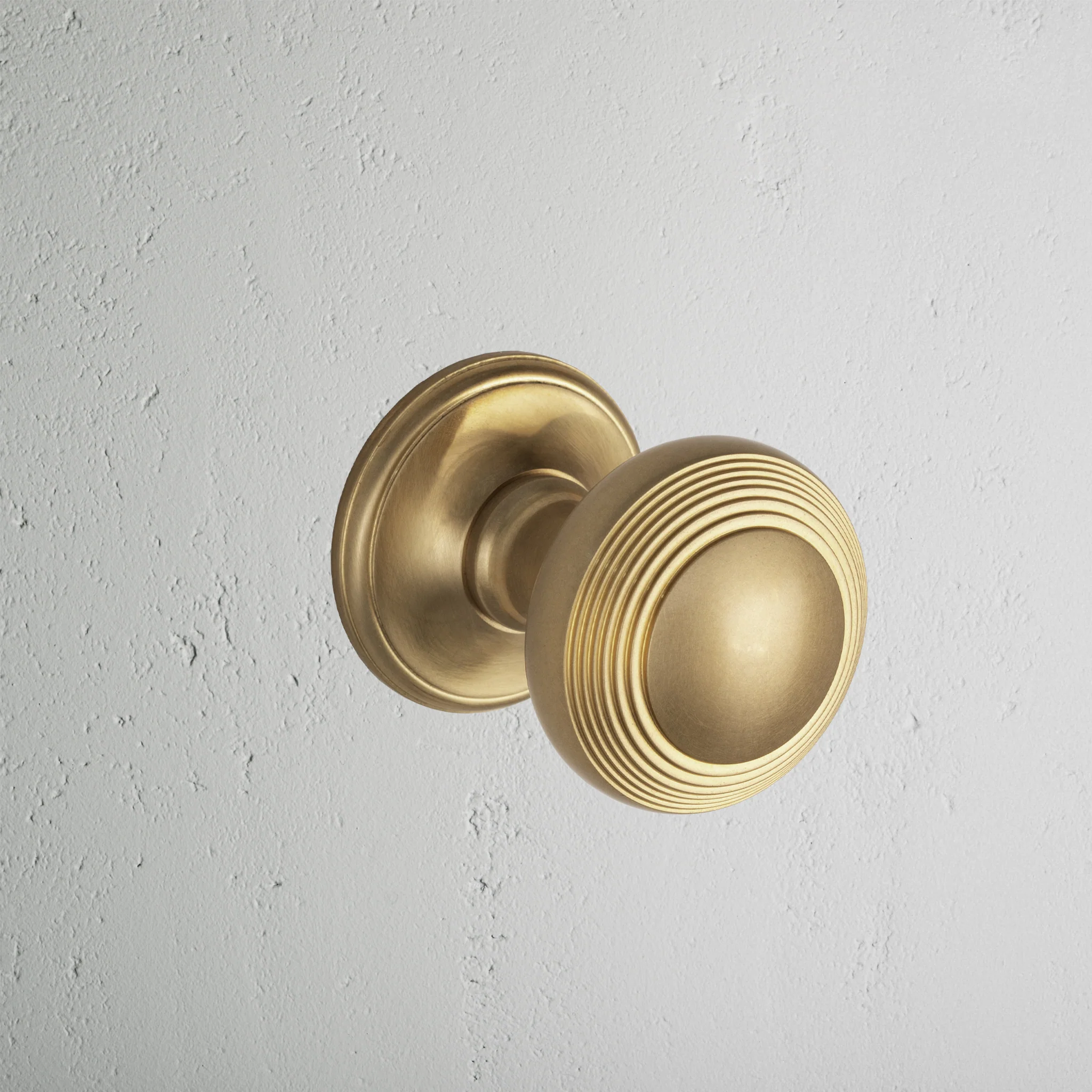 Poplar Sprung Door Knob - Antique Brass