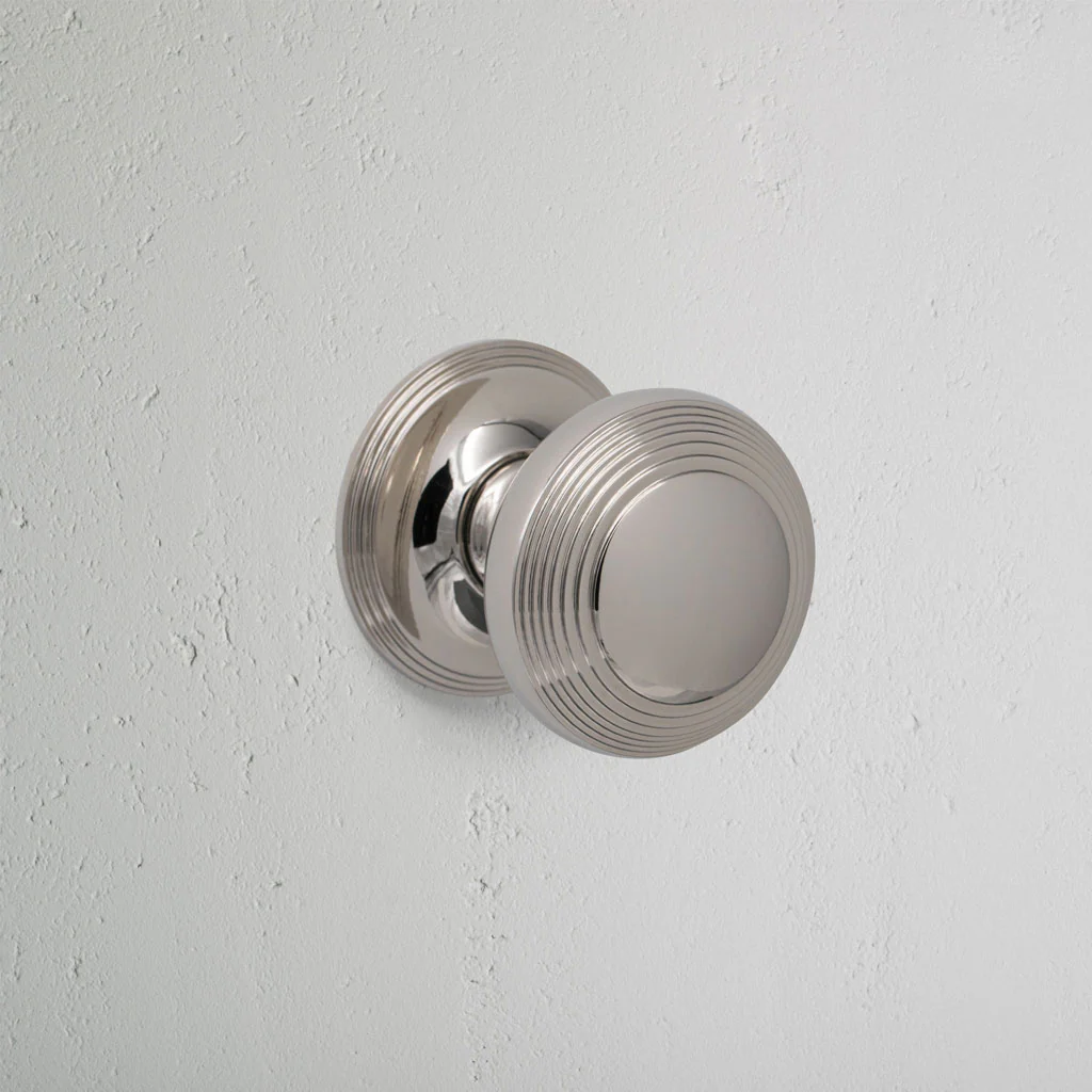 Poplar Sprung Door Knob - Polished Nickel